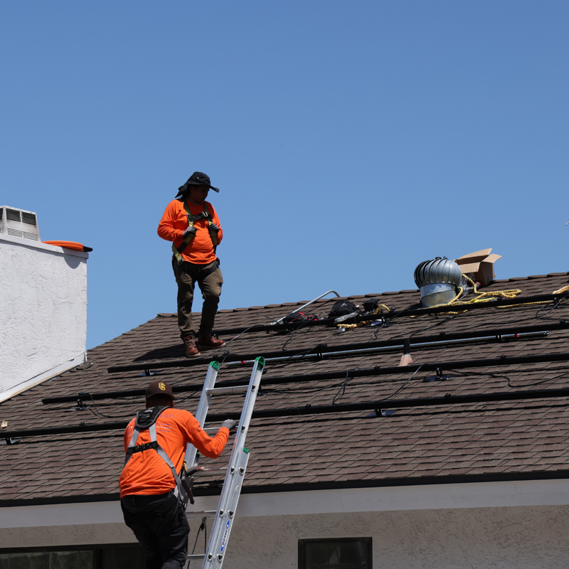 SolarTech crew installing on rooftop