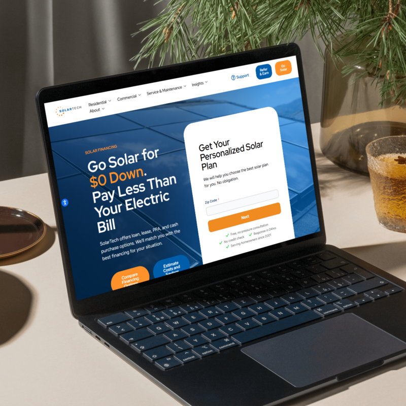 SolarTech redesigned website on laptop