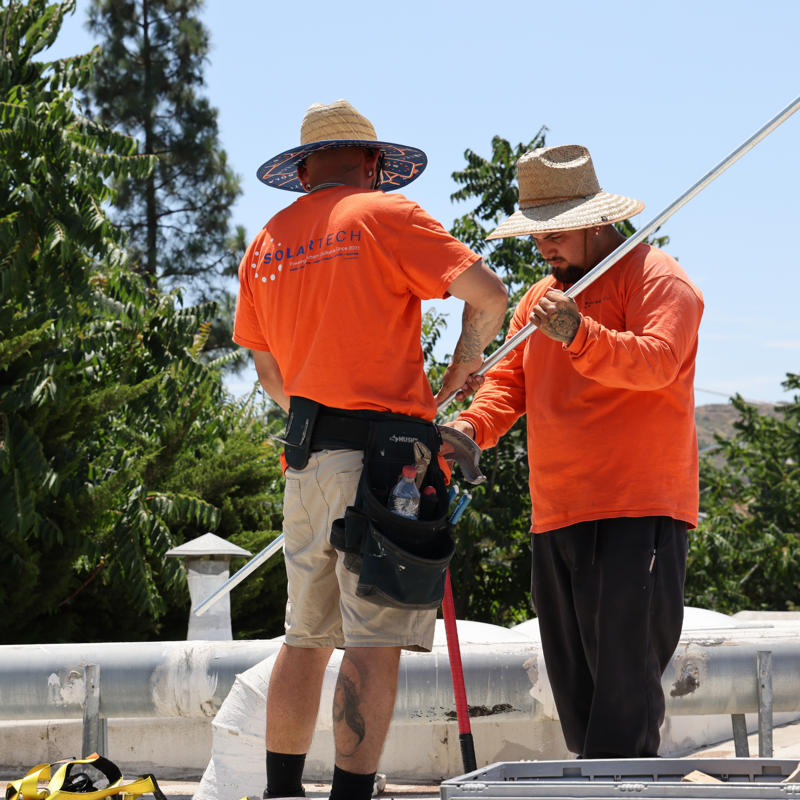 SolarTech crew working on roof
